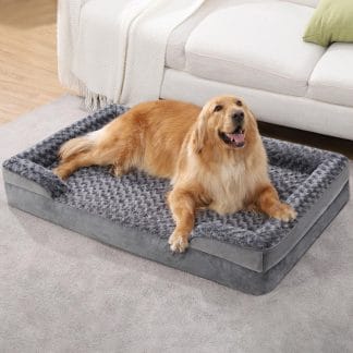 Dog relaxing in a bolster bed during fireworks